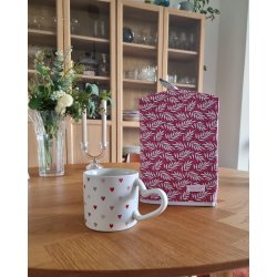 Kaffehtte i rd med gr blade