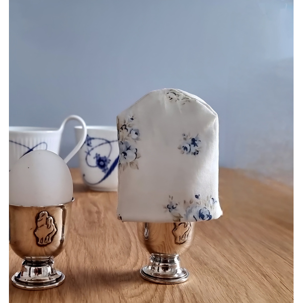 �ggevarmer offwhite med bl� blomster