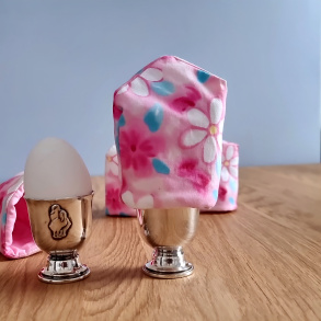 �ggevarmer til morgenbordet i pink