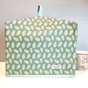 Stor tehtte i lys grn med blade 