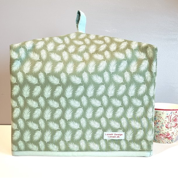 Stor tehtte i lys grn med blade 