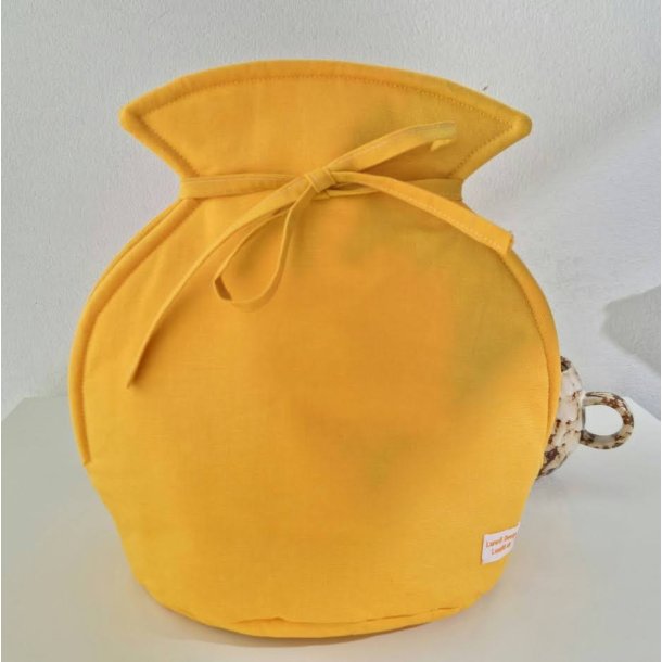 Tetaske i gul - der nemt sttes fast p tepotten