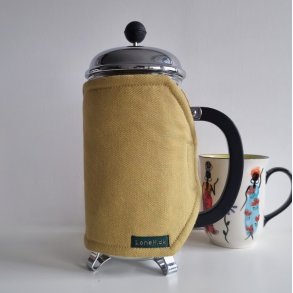 Kaffevarmer i gylden oliven