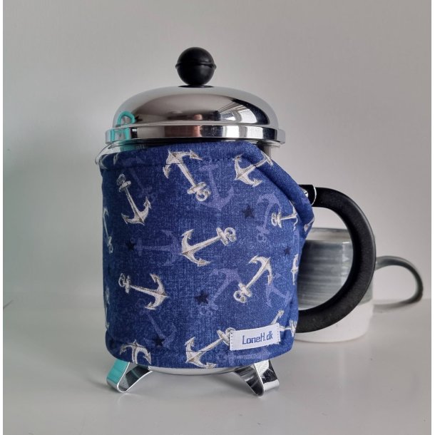 Kaffevarmer i bl med hvide ankere