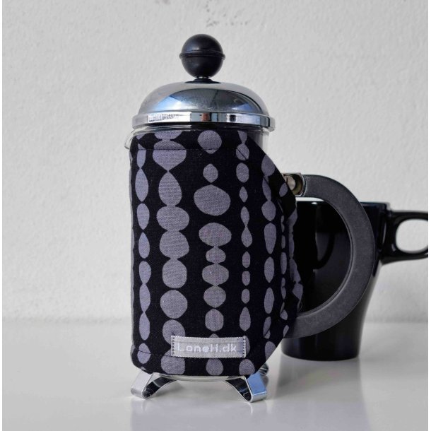 Kaffevarmer sort med med gr drber p snor