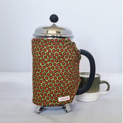 Kaffevarmer grn med rde prikker