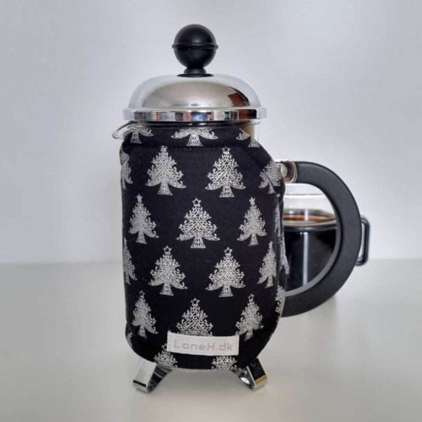 Kaffevarmer med juletrer til den lille stempelkande