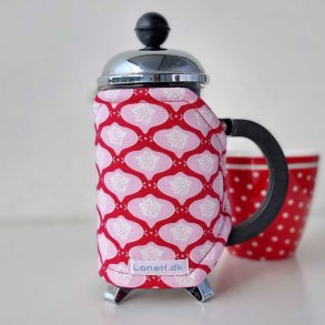 Kaffevarmer i frisk rd og lyserd lille stempelkande