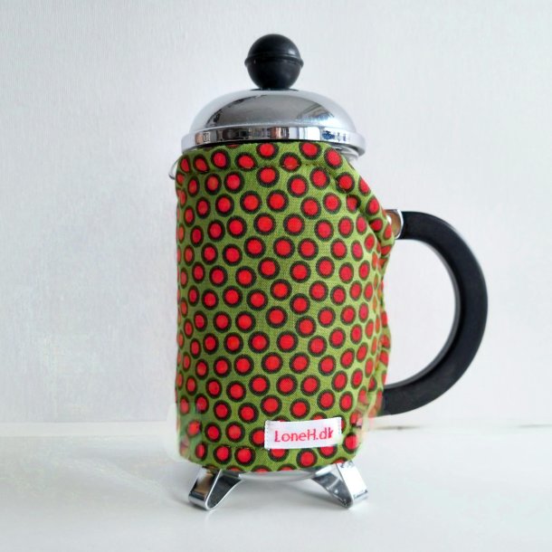 Lille Kaffefrakke med r�de prikker p� gr�n bund