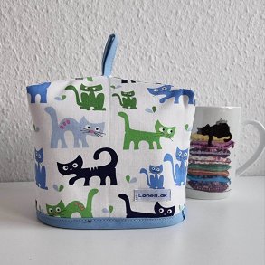 Kop varmer med katte