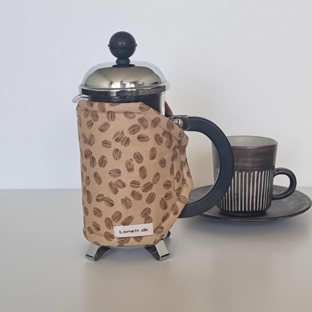 Kaffevarmer med lyse kaffebnner