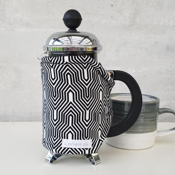 Kaffefrakke i et flot m�nster i sort og hvidt 