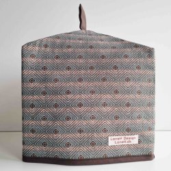 Tehtte i et naturfarvet i geometrisk mnster