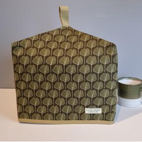 En lille tehtte i olivengrn med blade