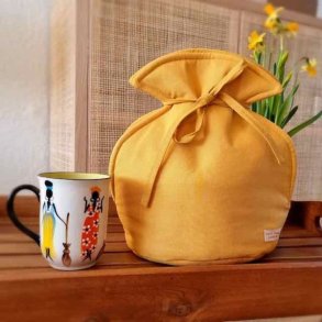 Tetaske i gul - der nemt sttes fast p tepotten