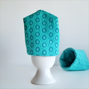 Turkise �ggevarmer med sm� cirkler