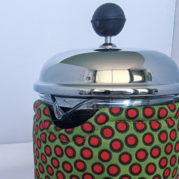 Kaffevarmer grn med rde prikker