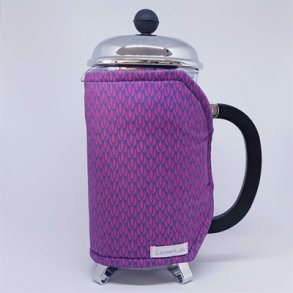 Kaffevarmer i bl og pink - som et frisk pust