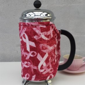 Kaffevarmer  med lyserde sljfer