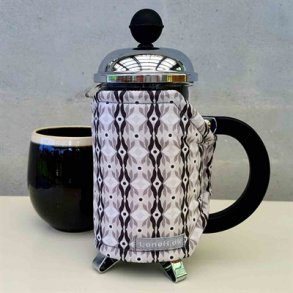 Kaffevarmer med sorte jne til lille stempelkande