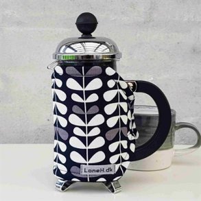 Kaffevarmer i sort med hvide og gr blade