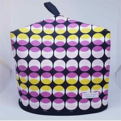 Stor tehtte i sort, gul og lyserd