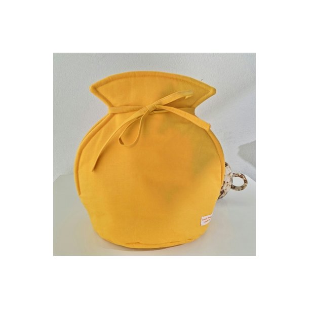 Tetaske i gul - der nemt sættes fast på tepotten