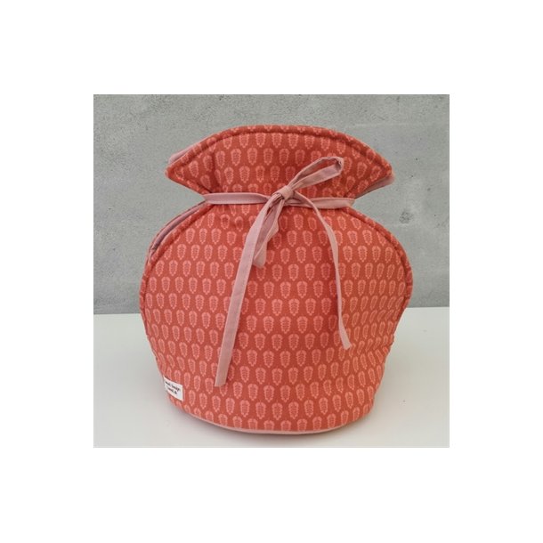 Tetaske i paprika til at stte tepotten ned i